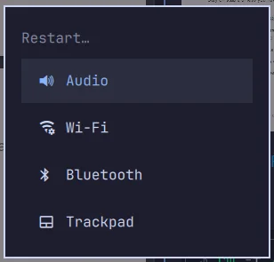 The real Omarchy hardware Restart menu, listing Audio, Wi-Fi, Bluetooth, and Trackpad as individually restartable subsystems
